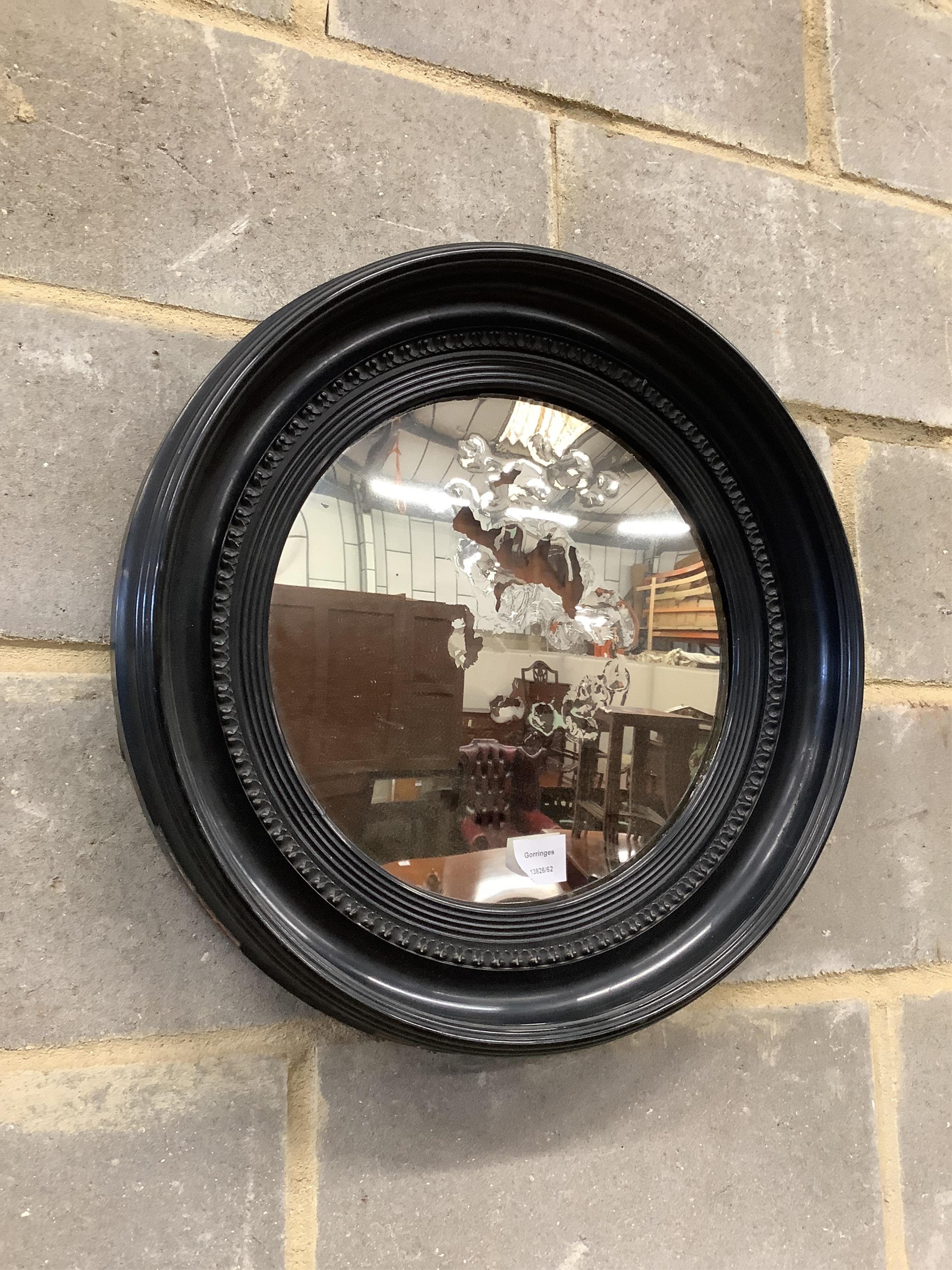 A circular convex wall mirror, diameter 51cm. Condition - poor